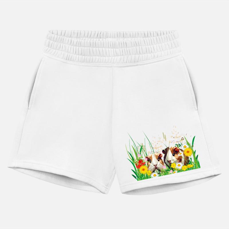 Two guinea pigs in the magic of a flower meadow