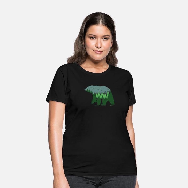 BEAR WITH FOREST IN BACKGROUND