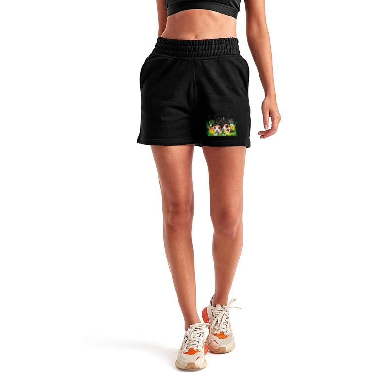 Two guinea pigs in the magic of a flower meadow