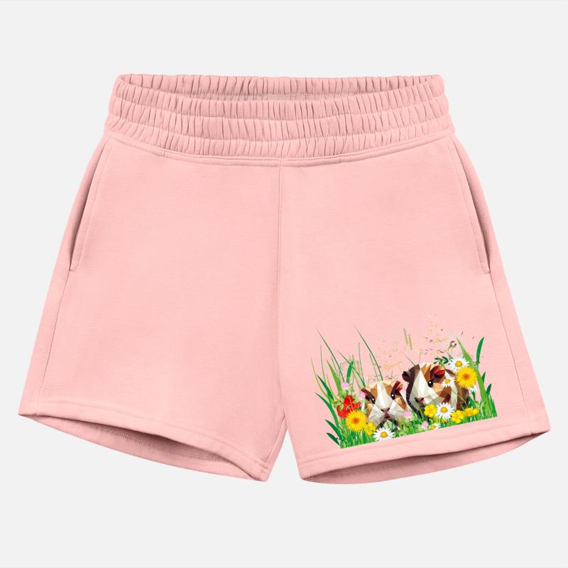 Two guinea pigs in the magic of a flower meadow